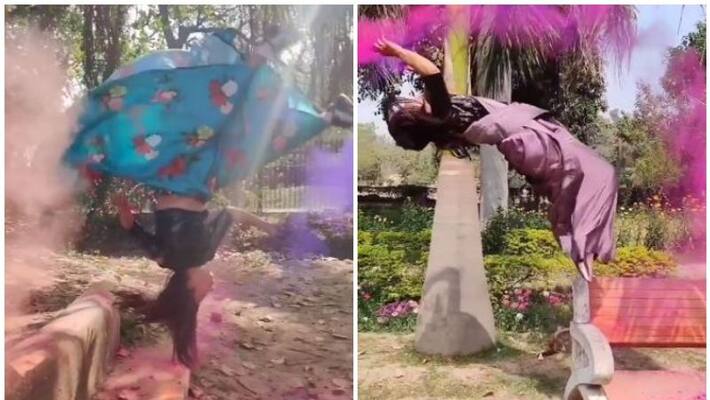 gymnast named Parul Arora holi with a colourful routin gymnast named Parul Arora holi with a colourful routin