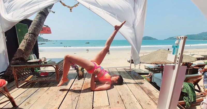 In the picture, Kavita is seen doing an 'asan' wearing that monokini and she captioned as "Dhoop bohot hai".