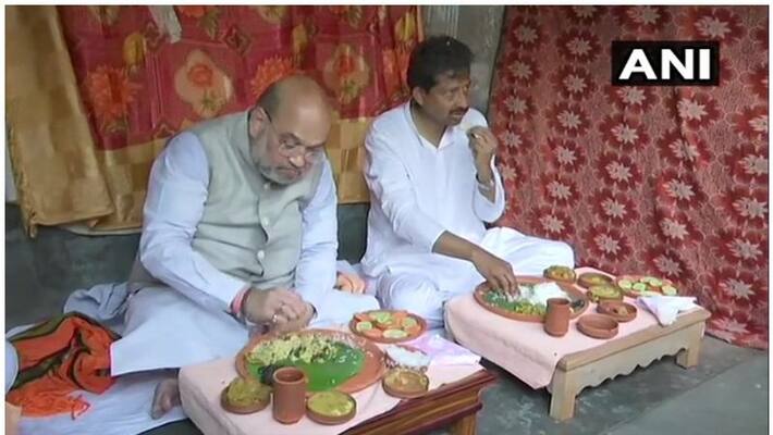 Amit Shah has lunch at the residence of a rickshaw puller Amit Shah has lunch at the residence of a rickshaw puller