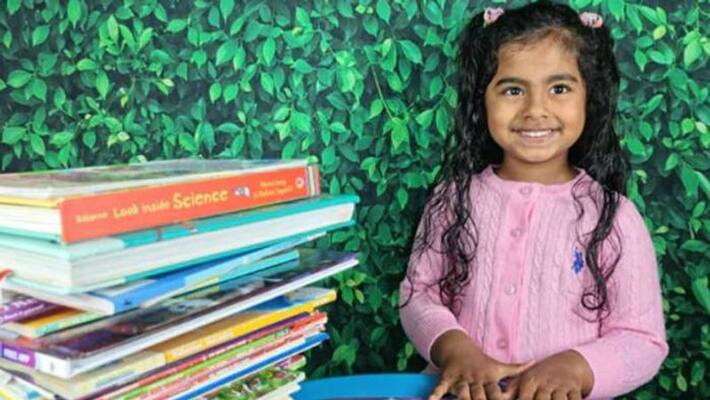 indian american girl sets world record for reading 36 books in two-hours PWA indian american girl sets world record for reading 36 books in two-hours PWA