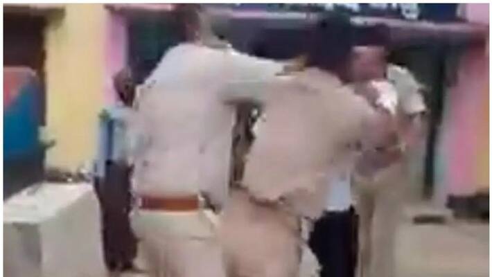 cops thrash man for not wear mask inside the temple cops thrash man for not wear mask inside the temple