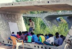 Delhi Math teacher from Uttar Pradesh teaches slum kids under flyover