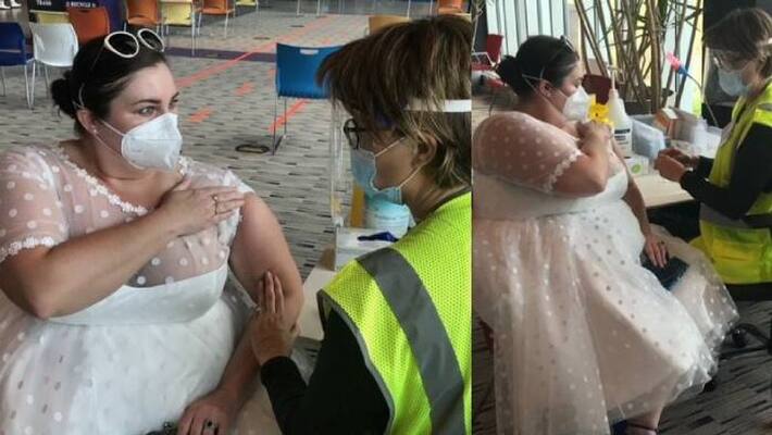 woman wears her wedding gown to get Covid vaccine woman wears her wedding gown to get Covid vaccine
