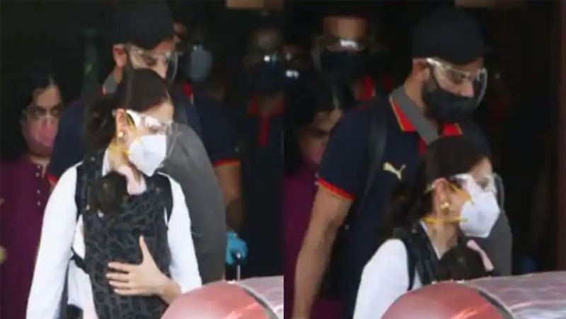 <p>हाल ही में चेन्नई से अपने मैच का शेड्यूल पूरा करके आरसीबी (RCB) की टीम मुंबई पहुंची है। जहां पर भी कप्तान कोहली अपने परिवार के साथ स्पॉट किए गए थे। इन तस्वीरों में उनकी 3 महीने की बेटी वामिका भी अपनी मां की गोद में नजर आ रही थी।</p>