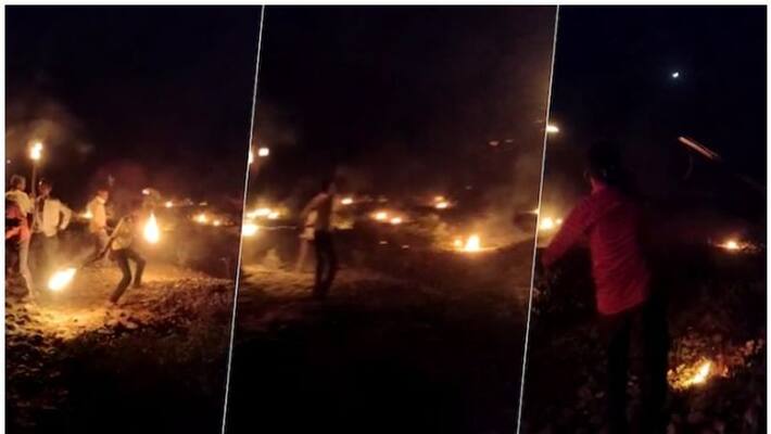 Locals in village run with torches to drive away corona virus Locals in village run with torches to drive away corona virus