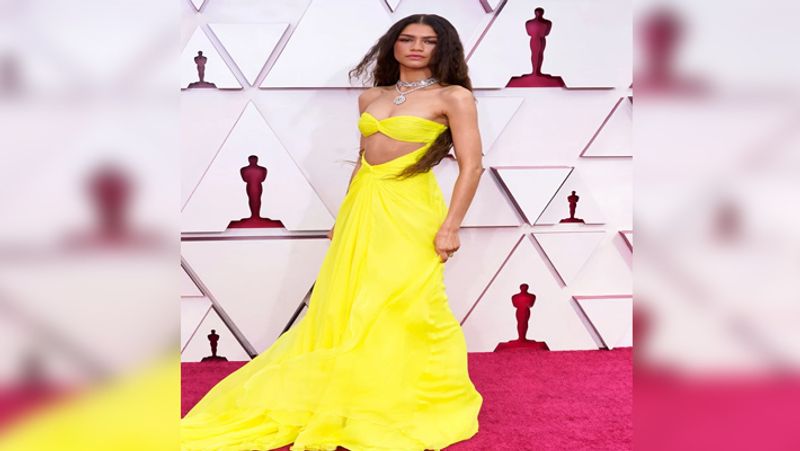 Zendaya made a star-studded entry in Maison Valentino flowy gown. (Image: Getty)