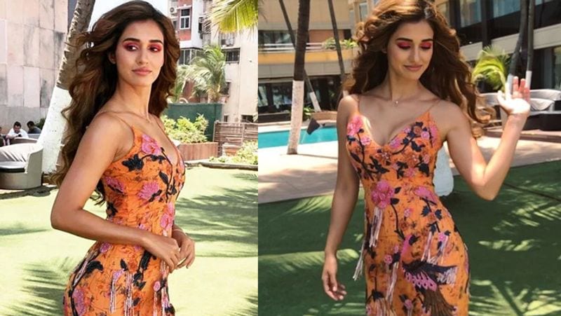 Super cute dress
This floral dress worn by Disha Patani is such a steal. Every girl must have a short summer dress, it makes a perfect outfit for day-time outings.