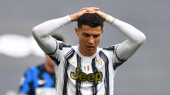 Cristiano Ronaldo does NOT look happy as Juventus star wears