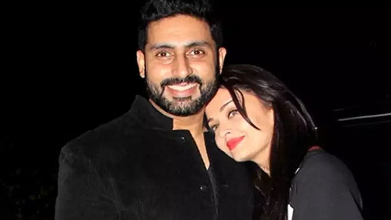 While she smiled and waved, Abhishek had a witty reply. Abhishek pointed at her and announced, "She married me, man."