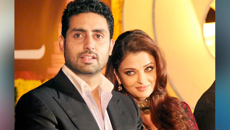 As the couple was posing for a photograph, Abhishek spotted a man who was holding a banner that read, "Marry Me", intended at Aishwarya.
