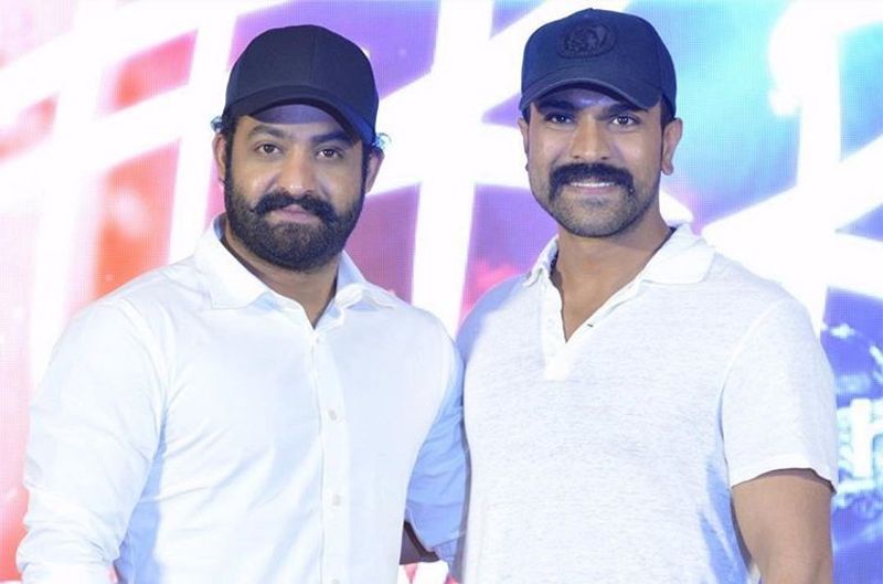రామ్చరణ్తో ఎన్టీఆర్. `ఆర్ఆర్ఆర్` ప్రెస్మీట్లో.
