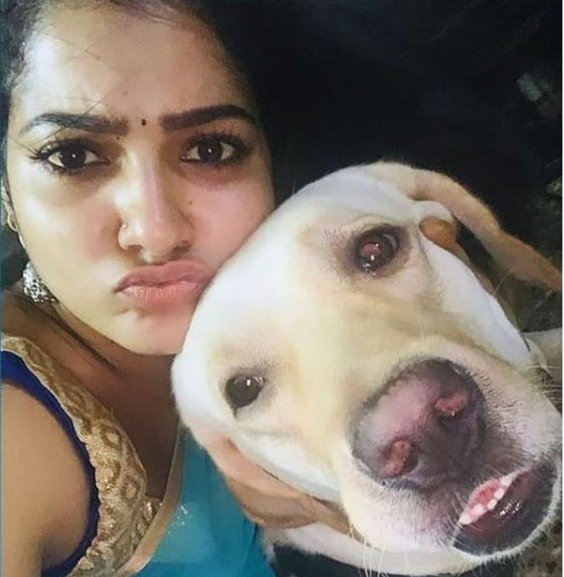 நாய் குட்டி மீது அவ்வளவு பாசமா 