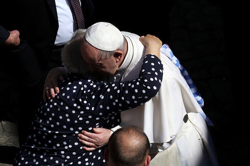 Pope Francis kisses Holocaust survivors tattoo