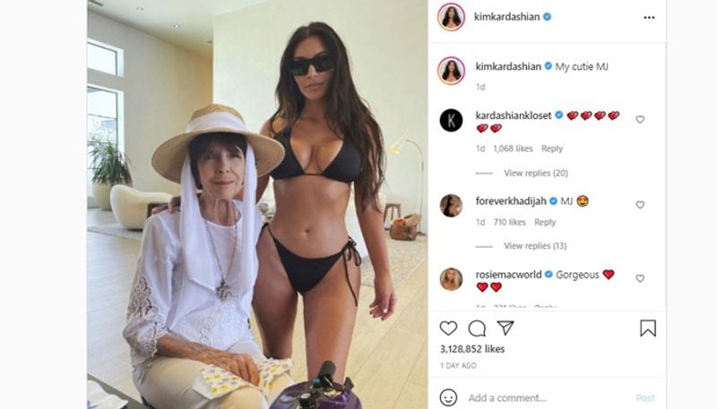 Kim recently shared a picture with her maternal grandma, 86-year-old Mary Jo "MJ" Shannon. In the picture, Kim is donning a sexy black bikini with matching shades standing next to Mary Jo 'MJ' Shannon. 