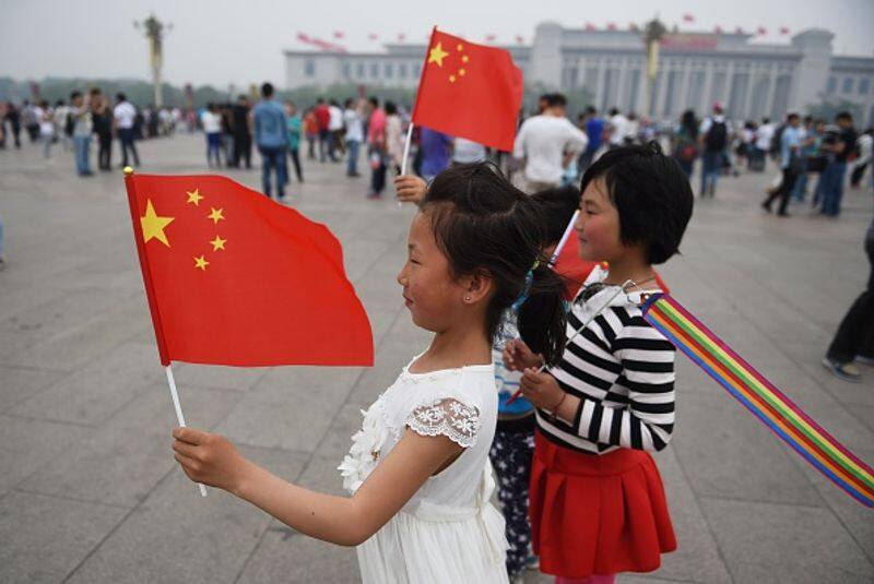 China removes child restraint plan