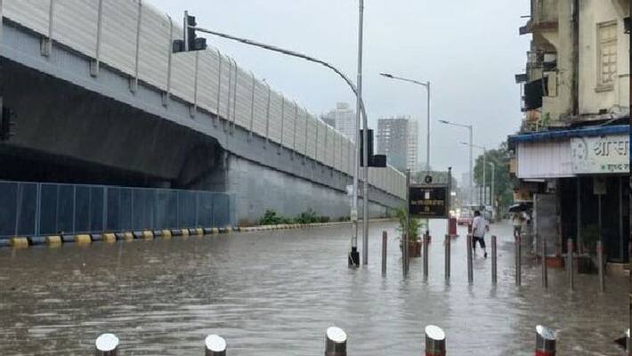 Mumbai rains IMD issues red alert for Mumbai as monsoon arrives Mumbai rains IMD issues red alert for Mumbai as monsoon arrives