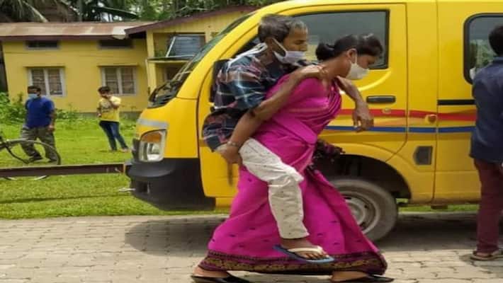Assam woman Niharika hits social media, taken Corona positive father-in-law to the hospital on her back DHA Assam woman Niharika hits social media, taken Corona positive father-in-law to the hospital on her back DHA