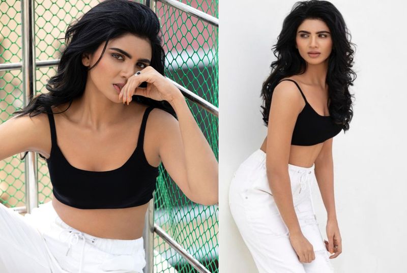 ఇన్నర్ వేర్ ని తలపిస్తున్న ఆమె టాప్ చూస్తుంటే సమ్మర్ వేడికి అలా వదిలేసిందేమో అన్న భావన కలుగుతుంది. వర్ష గ్లామరస్ ఫోటోలు వైరల్ అవుతున్నాయి.