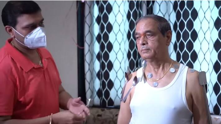 Nashik man claims he got magnetic powers after taking second dose of covid vaccine video Nashik man claims he got magnetic powers after taking second dose of covid vaccine video