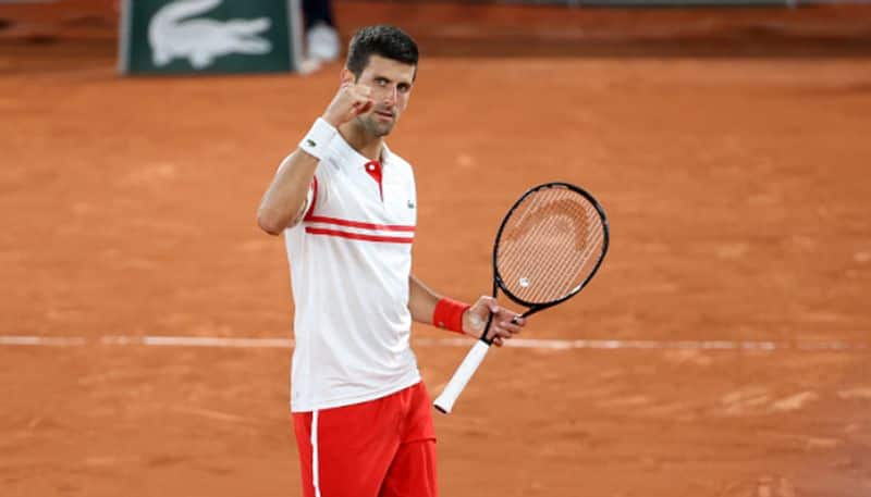 Novak Djokovic ends Rafael Nadal's perfect record in French Open semi-finals