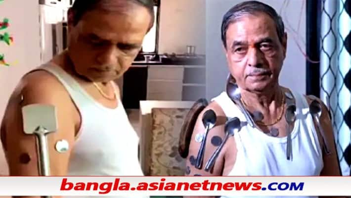Nasik man claims his body become a magnet after getting Covid-19 Vaccine ALB Nasik man claims his body become a magnet after getting Covid-19 Vaccine ALB
