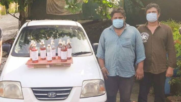 two youths arrested for illegal liquor smuggling in kozhikode two youths arrested for illegal liquor smuggling in kozhikode
