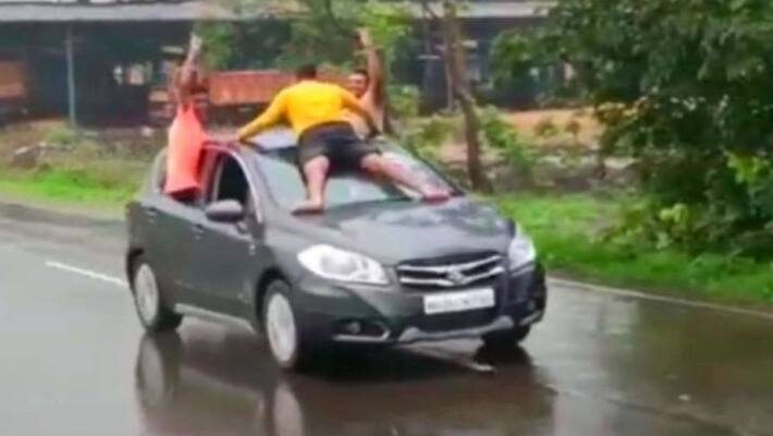 Youngsters stunt on a moving car goes viral Youngsters stunt on a moving car goes viral