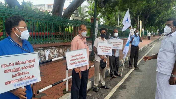 kerala retail footwear association protest against lockdown kerala retail footwear association protest against lockdown