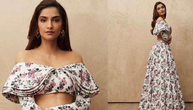 The maxi style skirt looked gorgeous on Sonam. It has soft pleating that falls from a structured waistband. Both the skirt as well as the top has pretty floral prints in beautiful pink and purple colours.