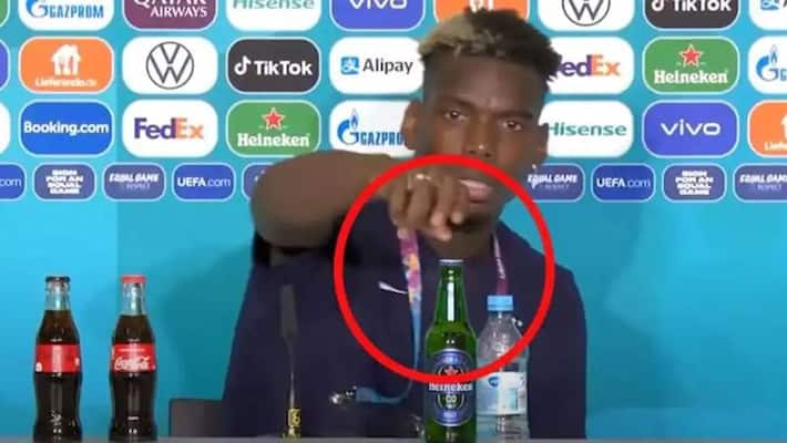 Paul Pogba removes Heineken bottle at press-conference Paul Pogba removes Heineken bottle at press-conference