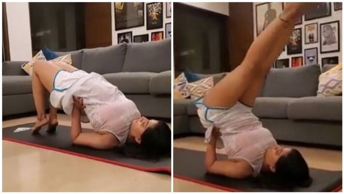 actress varalakshmi sarathkumar glamourize yoga video goes viral actress varalakshmi sarathkumar glamourize yoga video goes viral