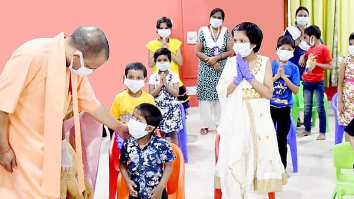 CM Yogi Adityanath announces pension of children who lost their parents to COVID-19 pwa CM Yogi Adityanath announces pension of children who lost their parents to COVID-19 pwa