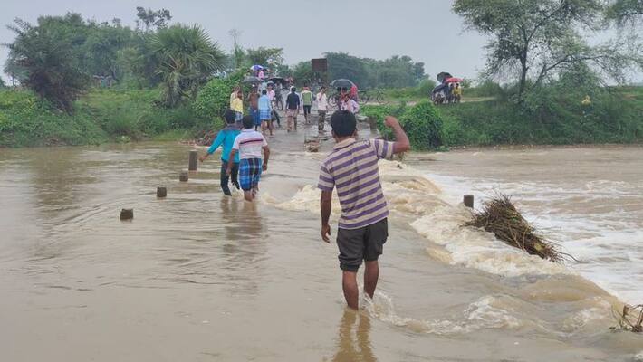 Sccoty trapped in stream:two teenage girls swept away in Yadadri bhuvanagiri district Sccoty trapped in stream:two teenage girls swept away in Yadadri bhuvanagiri district