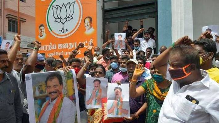 Puducherry BJP MLA John Kumars supporters stage protest Puducherry BJP MLA John Kumars supporters stage protest