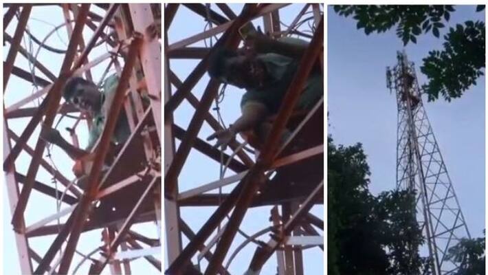 auto driver threatens to jump from mobile tower in aluva suicide threat auto driver threatens to jump from mobile tower in aluva suicide threat