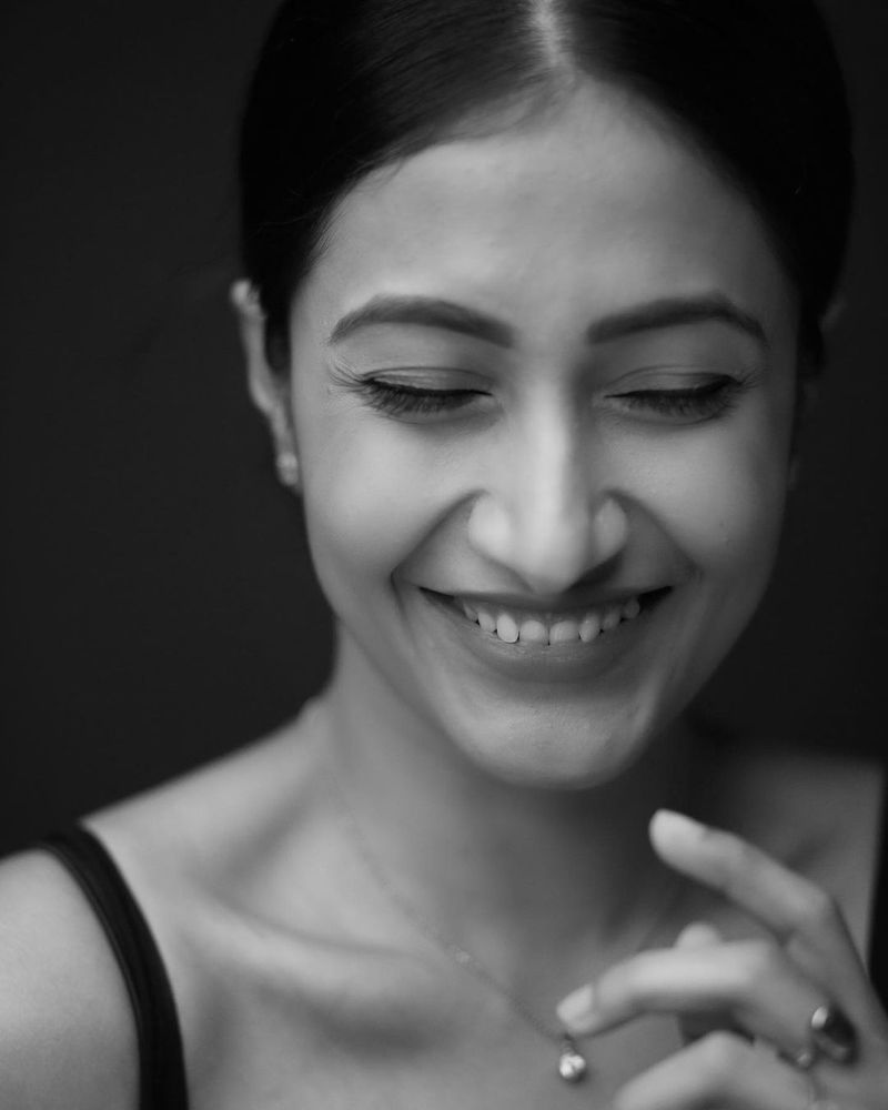 Recently, Dhanashree shared a couple of simple look of hers. In the first picture, she has clicked a close-up of her face, as she smiles, while the black and white filter gives it a captivating feel.