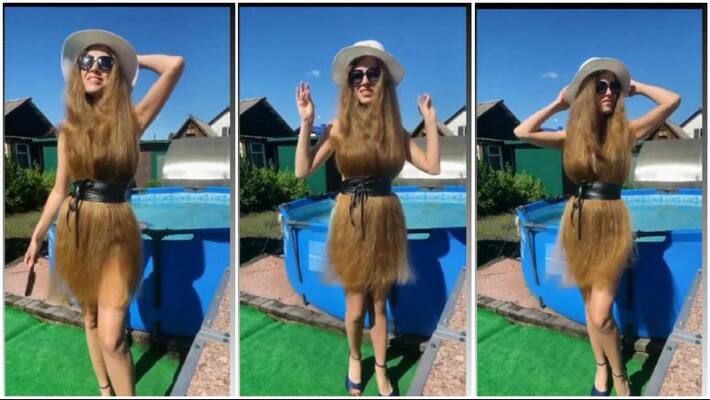 Her wears hair as dress in video Her wears hair as dress in video