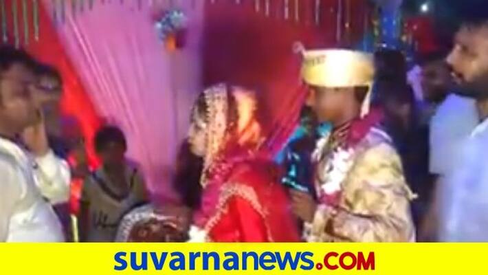 Man lifts bride during jaimala ceremony gets slapped old video goes viral pod Man lifts bride during jaimala ceremony gets slapped old video goes viral pod