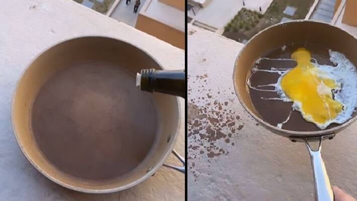 video in which woman cooks egg in sunlight video in which woman cooks egg in sunlight