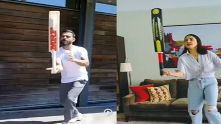 Anushka Sharma-Virat Kohli Bat Balance Challenge video goes VIRAL pwa Anushka Sharma-Virat Kohli Bat Balance Challenge video goes VIRAL pwa