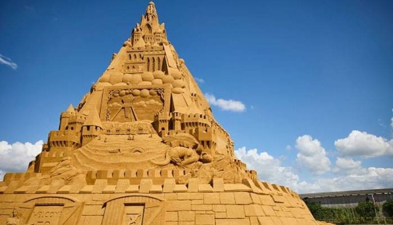 Dutch creator Wilfred Stijger and 30 other sand sculptors were involved in the construction of the sandcastle. At the top of the sandcastle is a crown, which Wilfred said is his interpretation of the Coronavirus. 