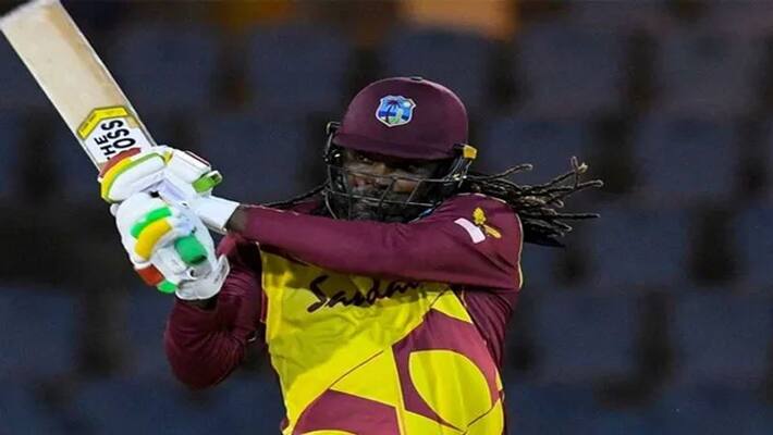 Chris Gayle becomes first batsman in universe to score 14,000 runs in T20 cricket dva Chris Gayle becomes first batsman in universe to score 14,000 runs in T20 cricket dva