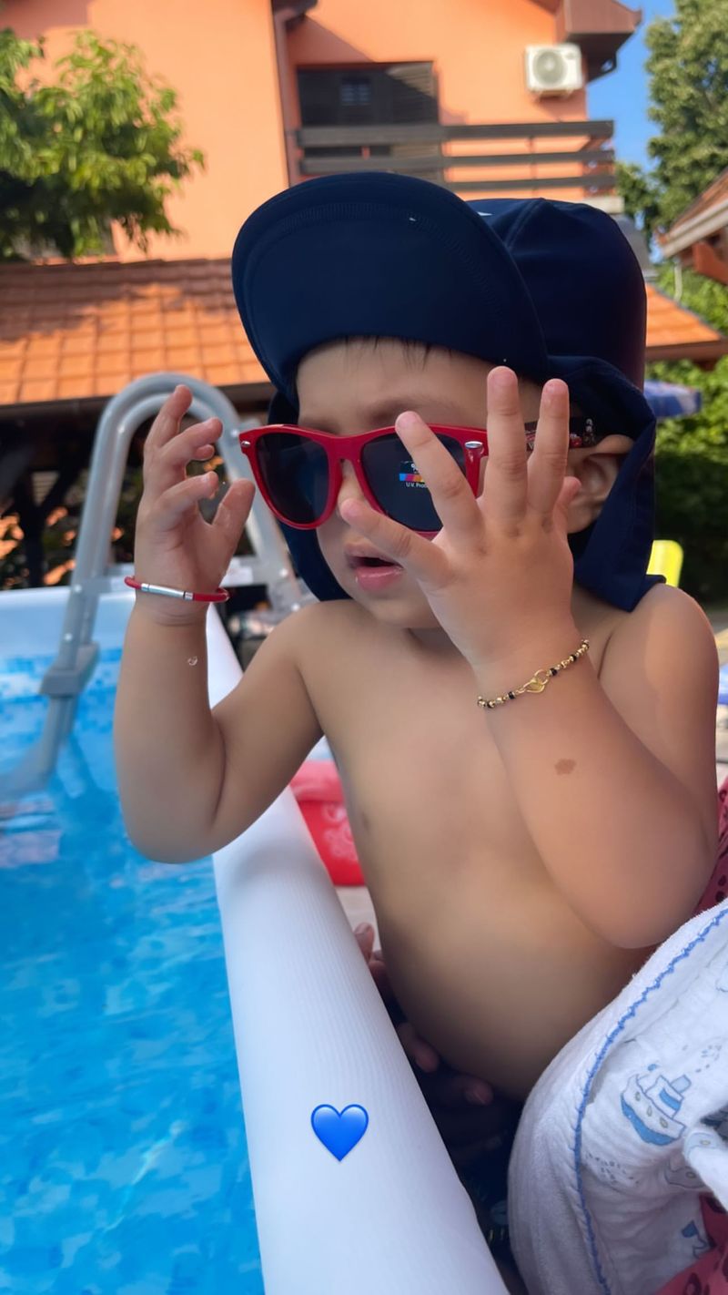 In another picture, while Agastya is seen posing in style by the swimming pool, he dons a sunglass.
