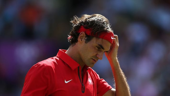 Injured Roger Federer withdraws from Tokyo Olympics Injured Roger Federer withdraws from Tokyo Olympics