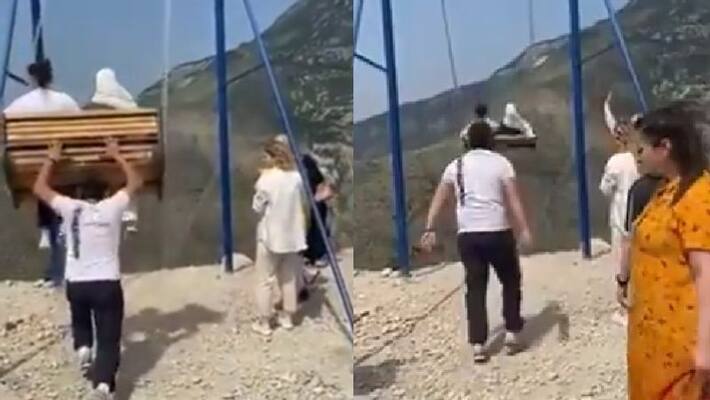 women fall off swing on the edge of cliff women fall off swing on the edge of cliff