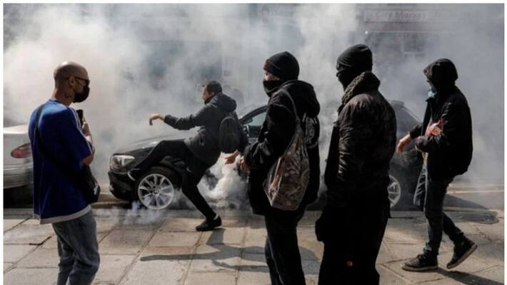 French police fire tear gas as anti-vaccine protest turns violent French police fire tear gas as anti-vaccine protest turns violent