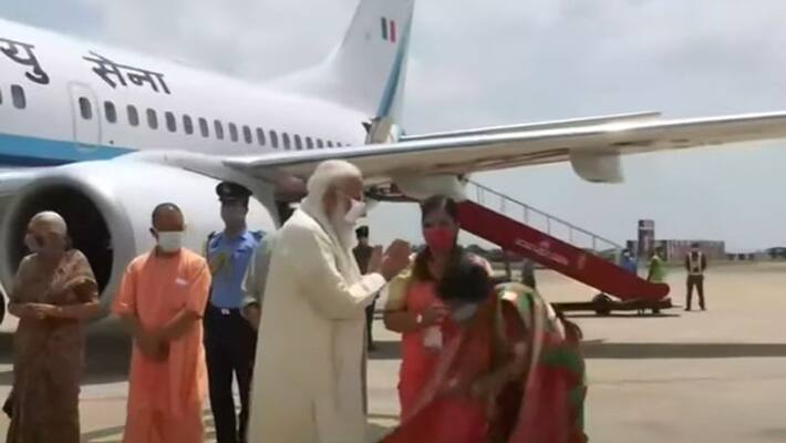 PM Modi arrives at the airport during his Varanasi visit kpn PM Modi arrives at the airport during his Varanasi visit kpn