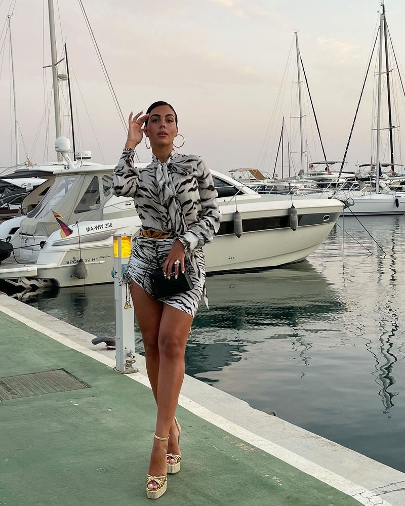 Meanwhile, Georgina recently displayed her style in a new dress and look, as she was seen wearing a zebra-striped dress, standing at the dockyard. She captioned it, "Many know my name, few know who I am. 🌹"