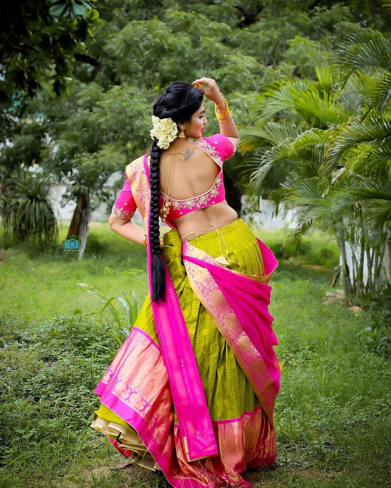 jabardasth varsha half saree hot photos fire on netizens pics mesmerizing