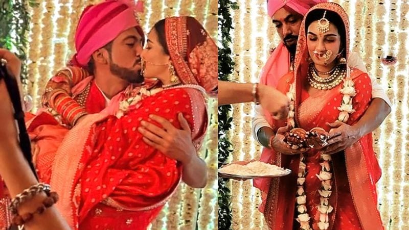 शादी के दौरान शाइनी दोशी हैवी लहंगे की जगह रेड कलर की बनारसी साड़ी में नजर आईं। इस साड़ी में शाइनी बेहद खूबसूरत लग रही थीं। अपने लुक को शाइनी ने कुंदन से बने हैवी नेकपीस, झुमके, मांगटीका और बड़ी-सी नथ से कम्प्लीट किया।
